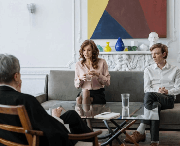 couple sitting with therapist